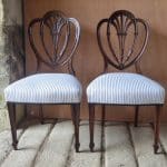 Pair of mahogany side chairs by Holland and Sons chairs Antique Chairs