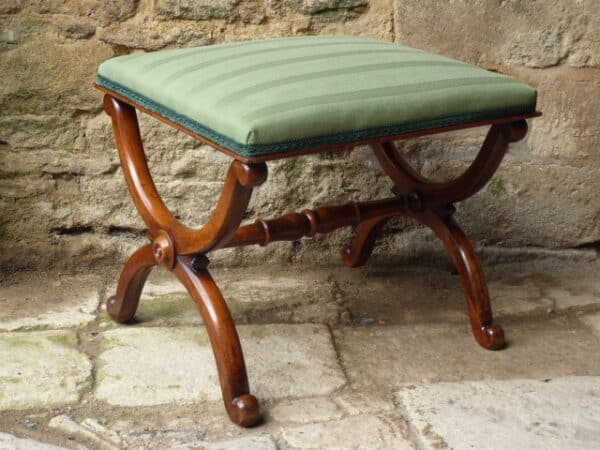 Walnut X-frame stool cirac 1840
