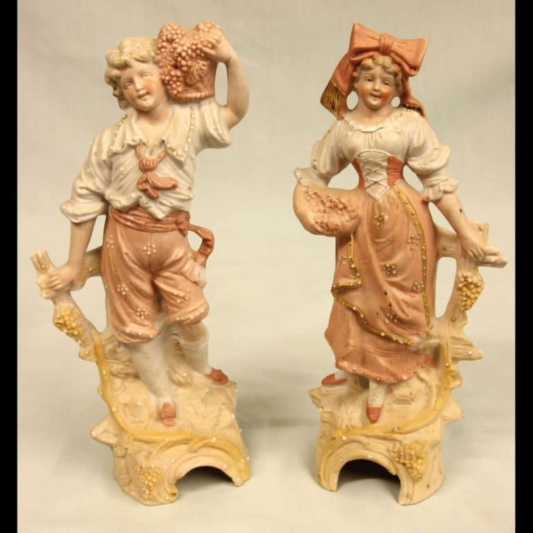 Pair of Bisque Figurines of Young Girl & Boy
