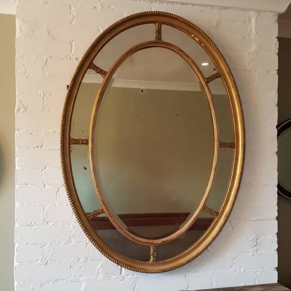English gilt oval mirror Adam style