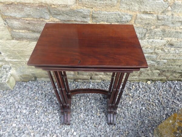 Nest of 3 Georgian mahogany tables.
