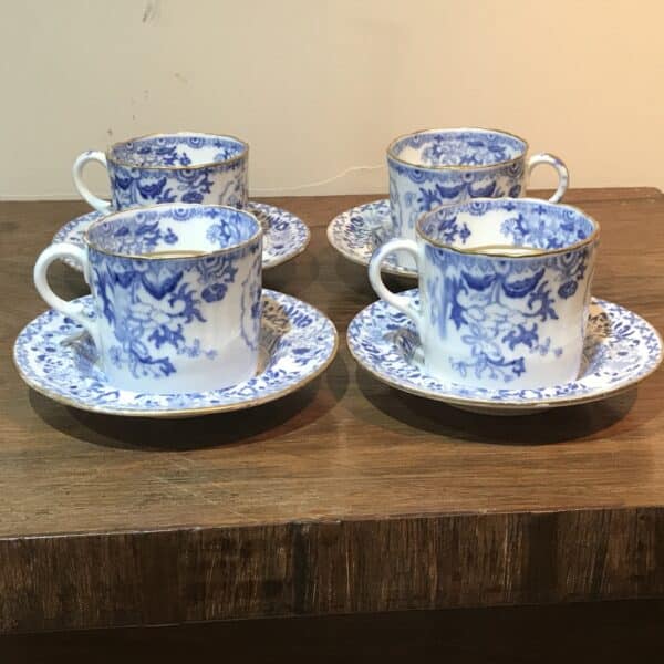 Set of four Worcester blue & white coffee cups with saucers
