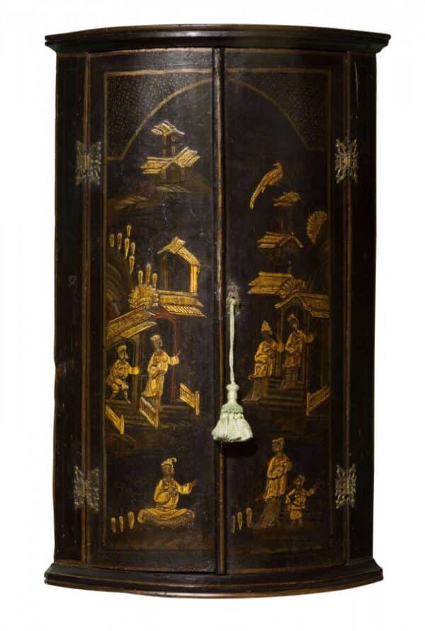 18thc bowfronted lacquered corner cupboard