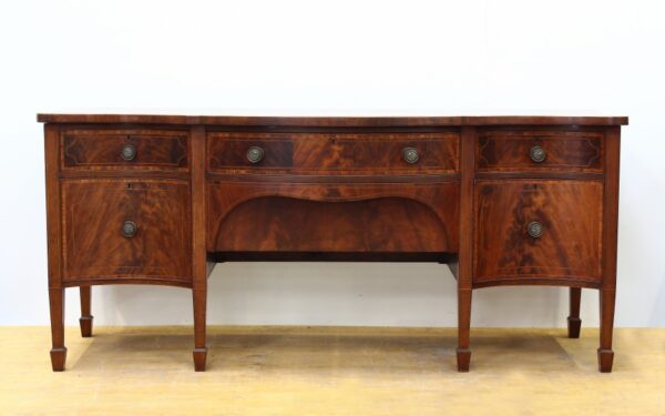 George III Serpentine Flamed Mahogany Sideboard