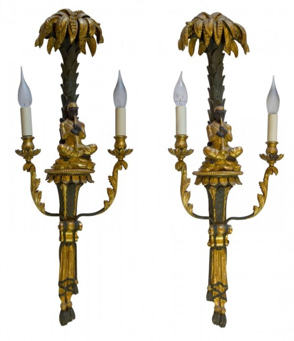 Pair of decorative carved wall sconces