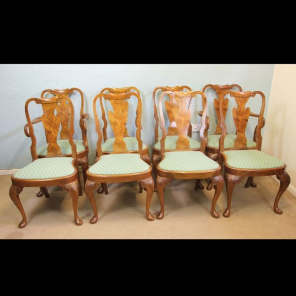 Set of Eight Queen Anne Style Walnut Dining Chairs.