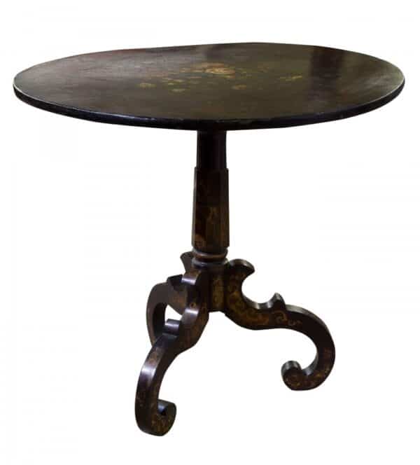 A 19thC ebonised papier mache centre table