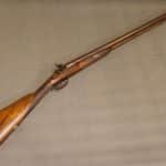 A Double Barrelled 12 Bore Percussion Fowling Piece Antique Guns