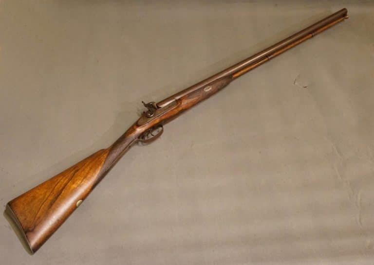A Double Barrelled 12 Bore Percussion Fowling Piece Antique Guns A Double Barrelled 12 Bore Percussion Fowling Piece