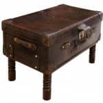 Leather suitcase on later stand Miscellaneous