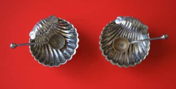 A Pair of antique Miniature Silver Plated Clam Shell Salt Servers & Spoons