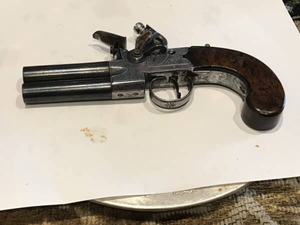 Flintlock double over & under pistol by Spencer of London