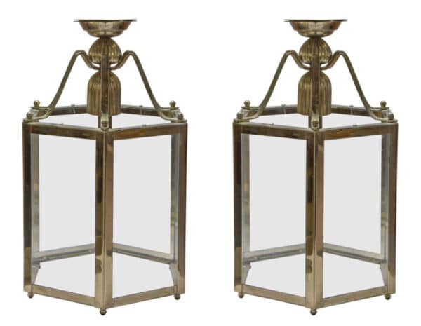 A pair of brass lanterns in the Georgian style