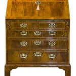A Queen Anne walnut and feather banded bureau Antique Bureau