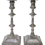 A superb pair of square based candlesticks Antique Collectibles