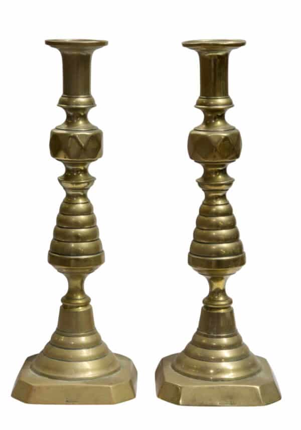 A large pair of Victorian Brass "Ace of Diamonds" candlesticks