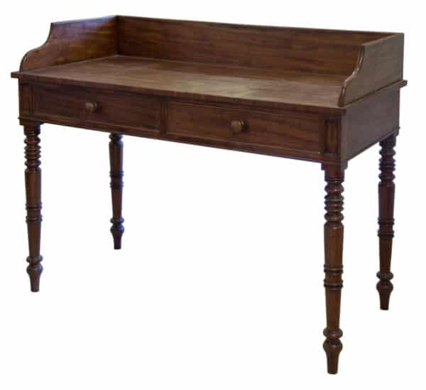 A Victorian side table with gallery and two drawers under