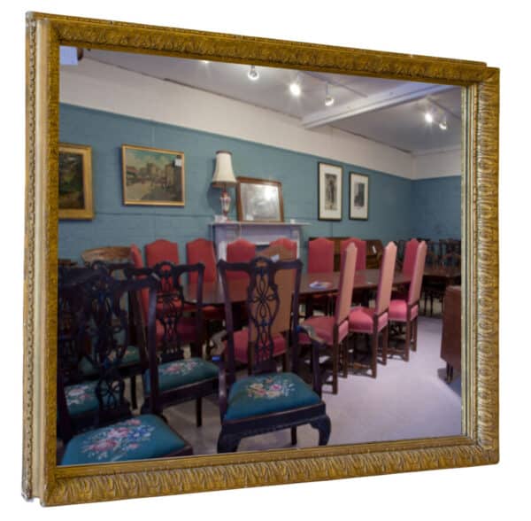 A large decorative gilt wood wall mirror