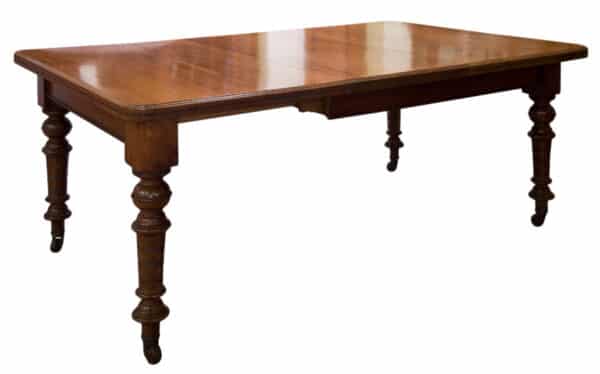 A Victorian and Walnut wind-extending table