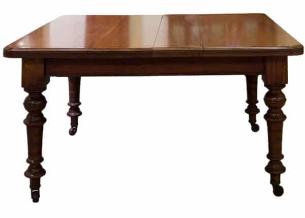 A Victorian and Walnut wind-extending table - Image 3