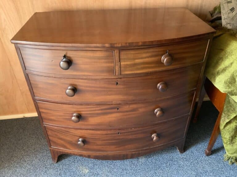 Georgian Bow fronted mahogany chest of two over three drawers
