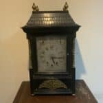 Bracket clock on eight bells ebonized case. Antique Clocks