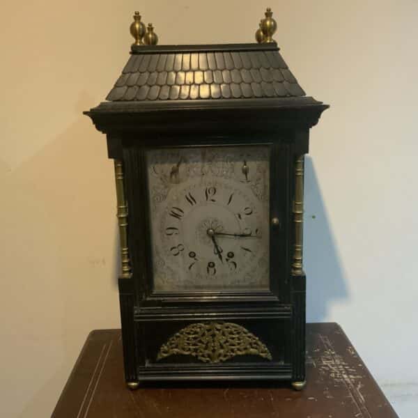 Bracket clock on eight bells ebonized case.