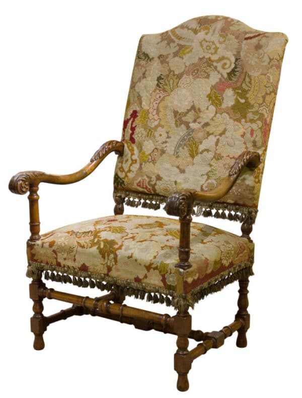 Louis XIV style carved walnut armchair