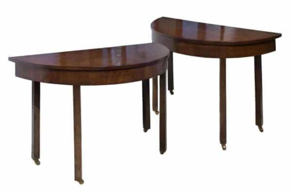 Pair of George III demi-lune console tables c1780
