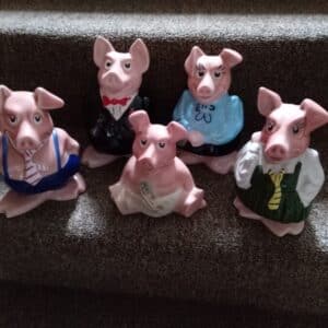 A NATWEST FAMILY OF MONEY BOX PIGS. Vintage