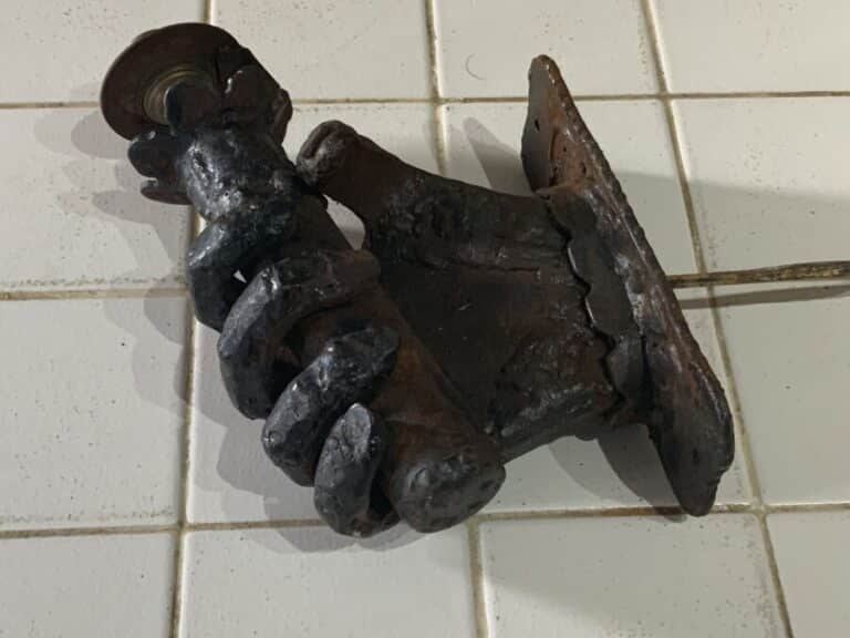 Wrought iron hand holding a spills converted to electric