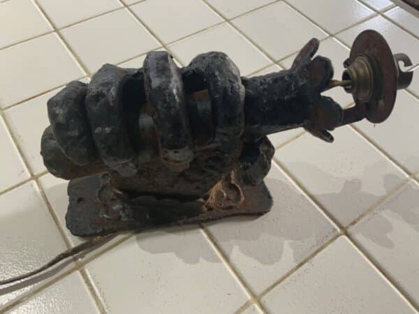 Wrought iron hand holding a spills converted to electric Architectural Antiques 4
