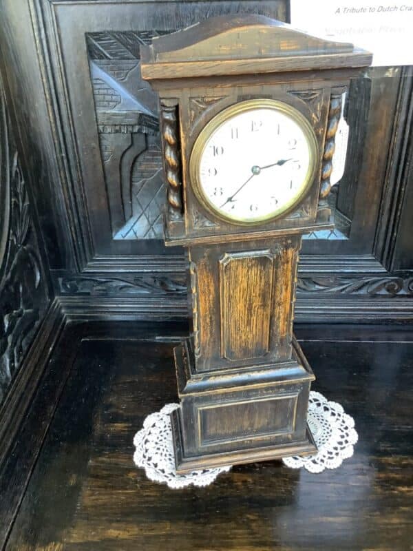 A MINIATURE GRANDFATHER CLOCK 8 DAY