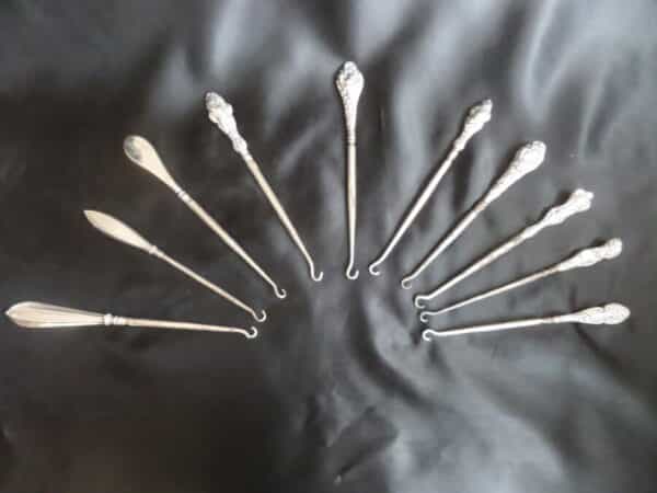 A COLLECTION OF VICTORIAN BUTTON HOOKS (many Silver Hallmarked)