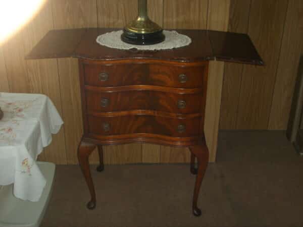 A SERPENTINE BEDSIDE CABINET WITH SIDE FLAPS Antique Furniture 6