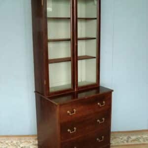 Victorian glazed bookcase with three drawers below. Antique Bookcases