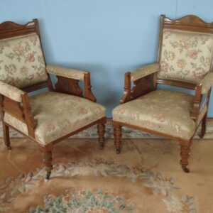 A pair of Edwardian Armchairs in Floral design fabric Antique Chairs