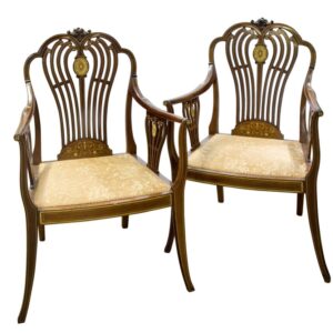 A pair of inlaid mahogany salon chairs Antique Chairs