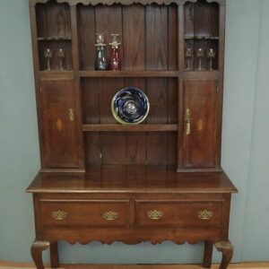 19th Century oak dresser of smaller proportions. With spice cupboards and mahogany inlay. Antique Dressers
