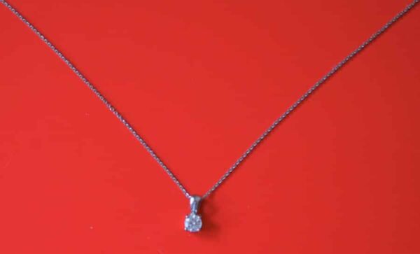 This is a beautiful vintage 750 Platinum 25 point Diamond Pendant - Image 2