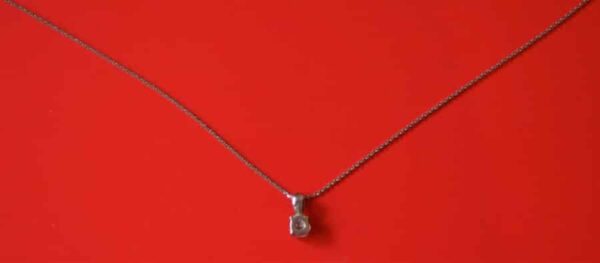 This is a beautiful vintage 750 Platinum 25 point Diamond Pendant - Image 4