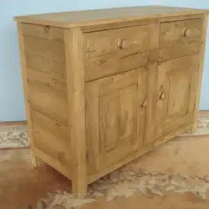 A Panelled Small Old Pine Dresser Base on stile supports Antique Dressers