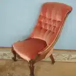 Ornately carved button back nursing chair Antique Chairs