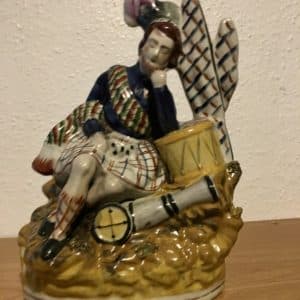 Staffordshire style pottery figurine Antique Collectibles