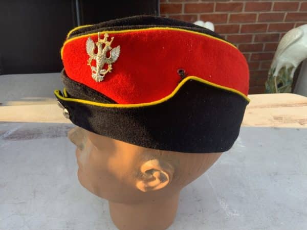British Hussars peaked cap and Badge