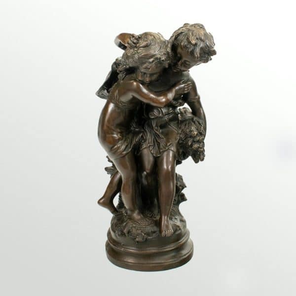 Bronze Statue of Two Children holding a Bouquet of Flowers, signed by Auguste Moreau.