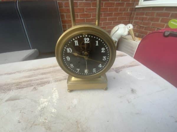 Gravity clock needing repair Antique Clocks 4