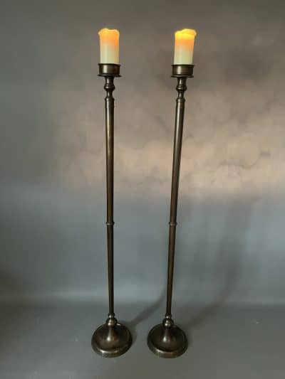 Pair of Tall Bronze Floor Standing Candle Holders