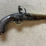 A brass barrelled flintlock pistol by Blake London Antique gun Antique Guns