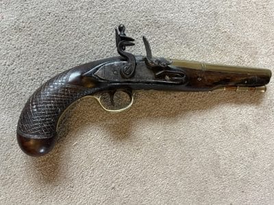 A brass barrelled flintlock pistol by Blake London